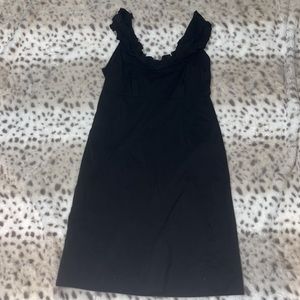 adorable black dress with ruffles at the top